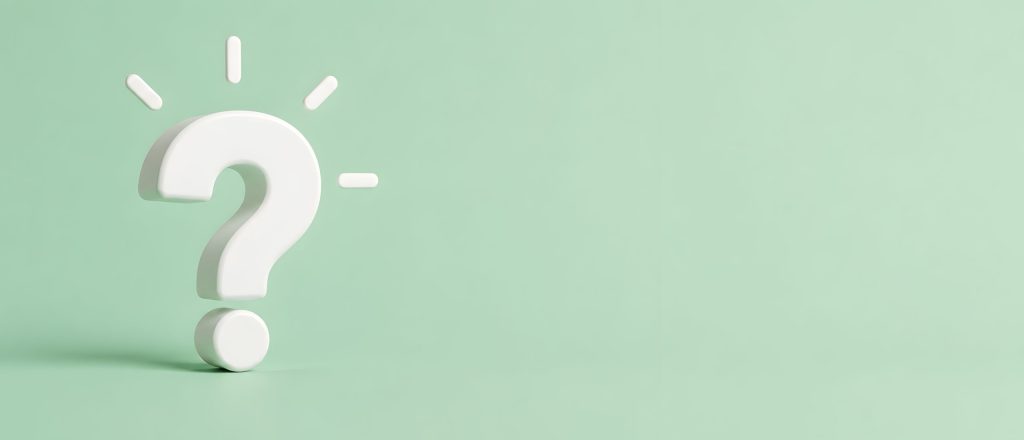 White question mark with glowing sparks on a green background representing creative idea realization and brainstorming concept